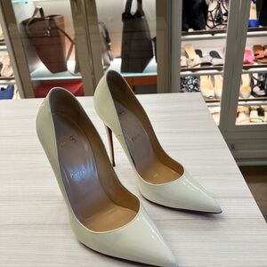 Christian Louboutin white patent leather So Kate pumps